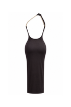 One-shoulder maxi dress with an open back and chain details